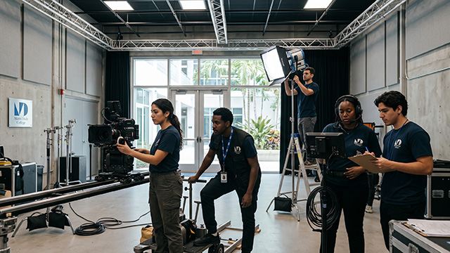A film crew recording a production in a studio