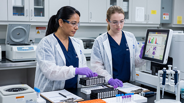 Health sciences students in a clinical training lab