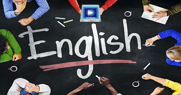 Group of students surrounding the word English written on a table