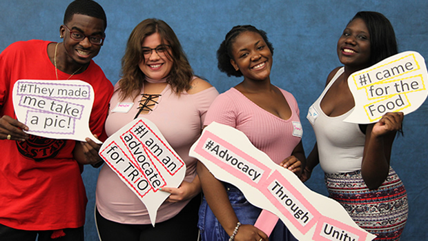 Four TRIO students pose for a picture
